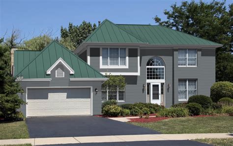 house colors with green metal roof|green roof with grey siding.